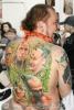 Большая, цветная татуировка на всю спину с героями кинофильма, комикса, видеоигры? Фото сделано на тату фестивале в Санкт-Петербурге в 2008 году