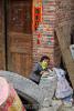 Маленькая китаянка из промышленного городка Sanjiang, провинции Guangxi, Южный Китай
