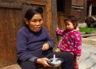 Жители китайской деревни национальных меньшинств – Жаосин